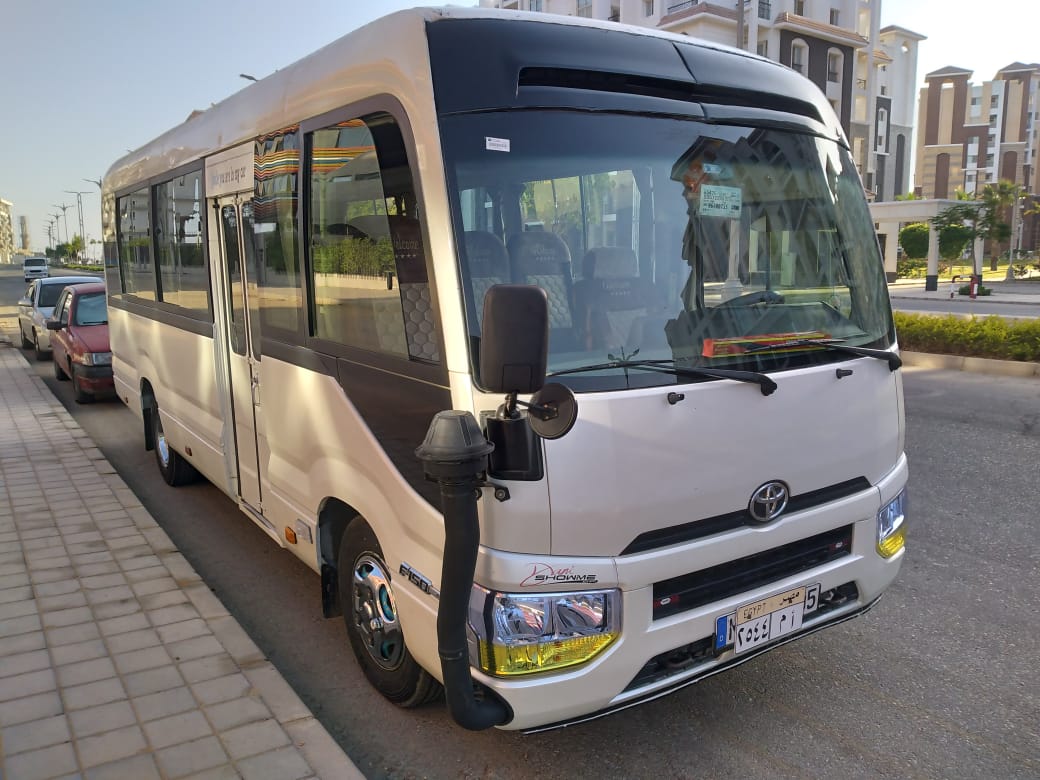 Comfortable and reliable transportation: Toyota Coaster 24 passengers for rent in Egypt